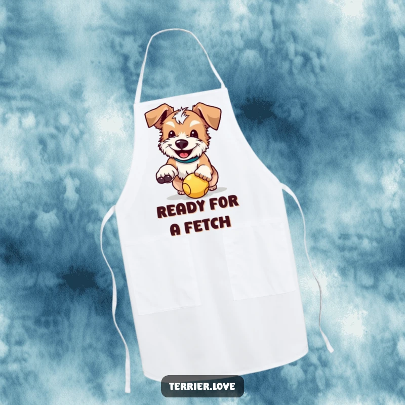 Funny apron with a happy terrier, floppy ears perked, focused on catching a ball while preparing food.