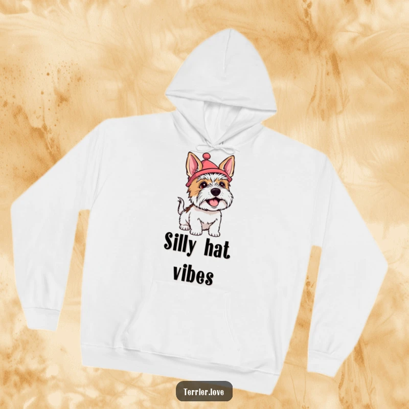 Funny terrier hoodie showing a happy dog wearing a silly hat and wagging its tail enthusiastically, radiating warmth and joy.