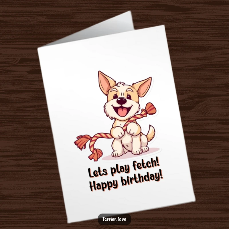 Funny Free Printable Birthday Card featuring a cheerful terrier with a wagging tail, proudly holding a rope toy, ready to celebrate.