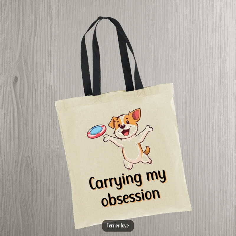 Funny tote bag illustrating a spirited terrier character mid-leap, expertly catching a flying disc with a joyful expression.
