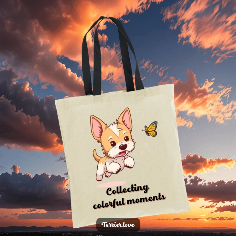 Funny terrier tote bag showing a playful dog with perked ears, chasing a fast-moving butterfly with delight.