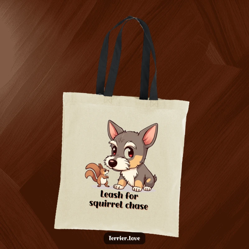 Funny terrier tote bag depicting a dog intently watching a scurrying squirrel, ideal for carrying essentials with a watchful and humorous flair.
